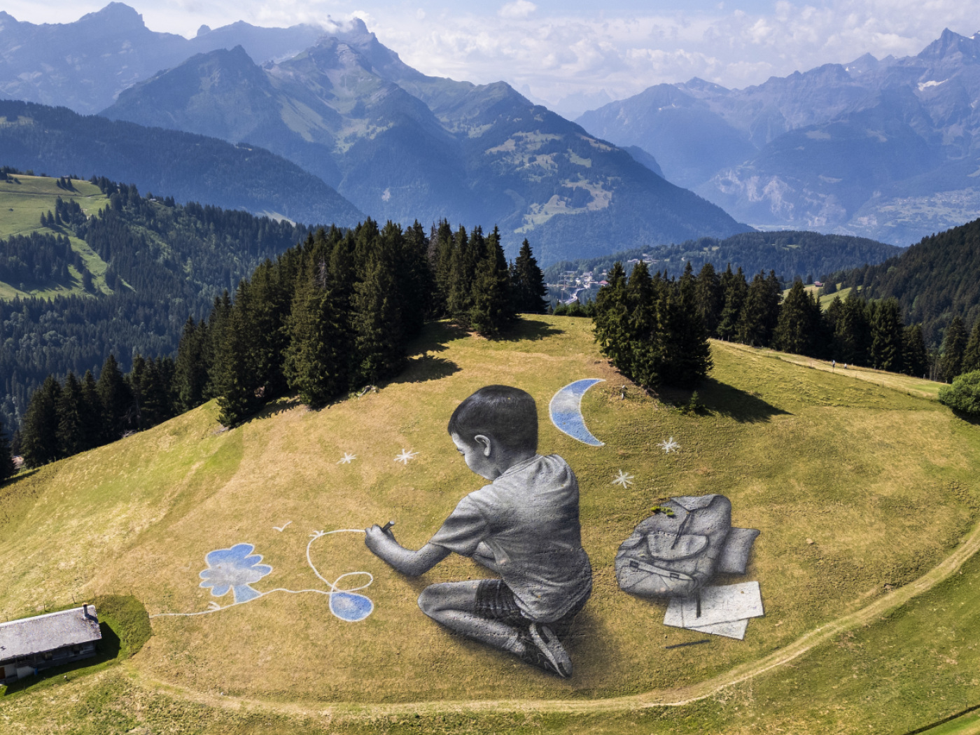 Two new murals by Saype in Villars-sur-Ollon (VD)