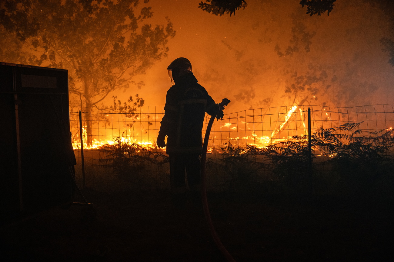 The fire, which has been raging since Wednesday, has already injured 84 firefighters.