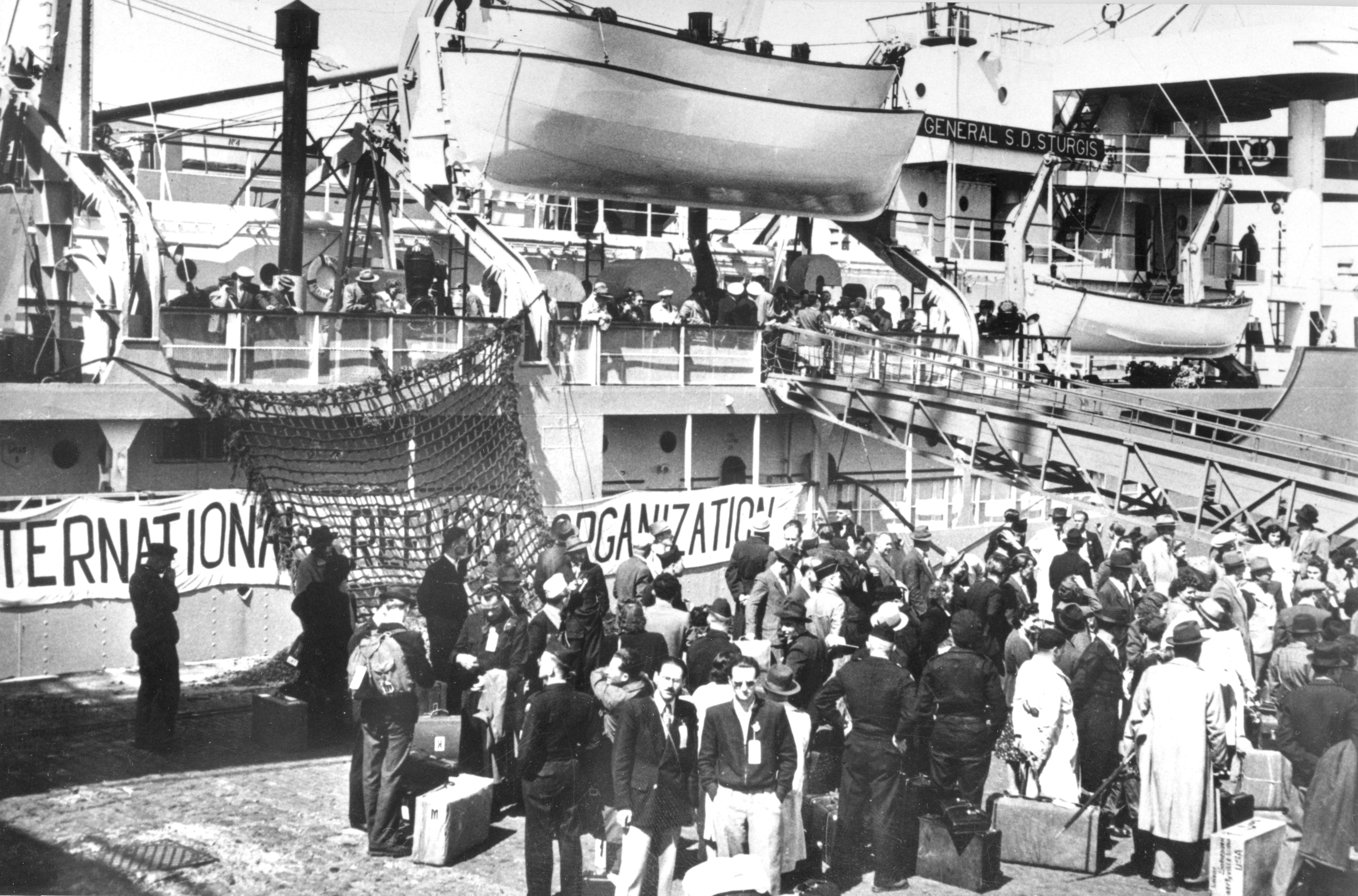 UNHCR's predecessor, the International Refugee Organisation (IRO) helped one million people to resettle overseas. Seen here are displaced persons from camps in Germany, Austria and Italy boarding an IRO-chartered ship on their to the United States.