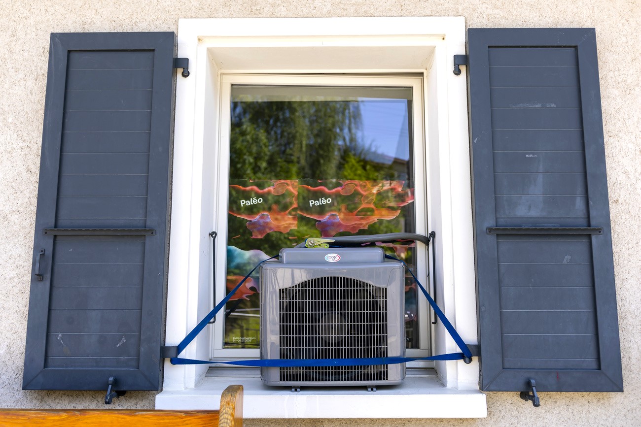 an air-conditioning fan on a window sill