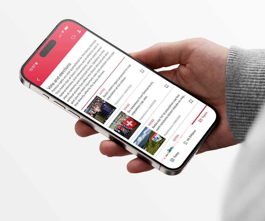 A smartphone held in one hand, with the SWIplus app open on the screen.
