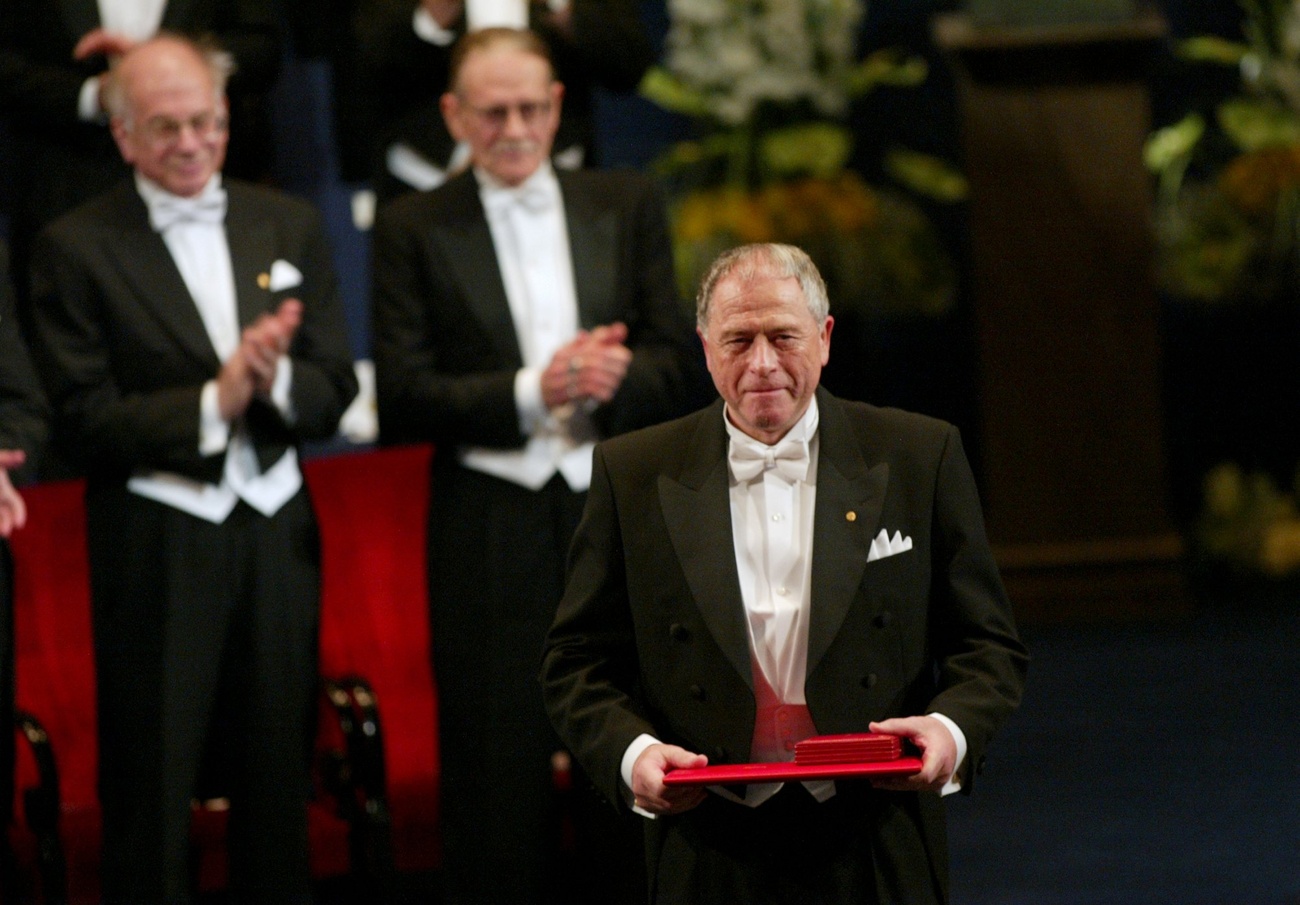 Kurt Wüthrich receives the Nobel Prize in Chemistry in Stockholm, Sweden, in 2002.