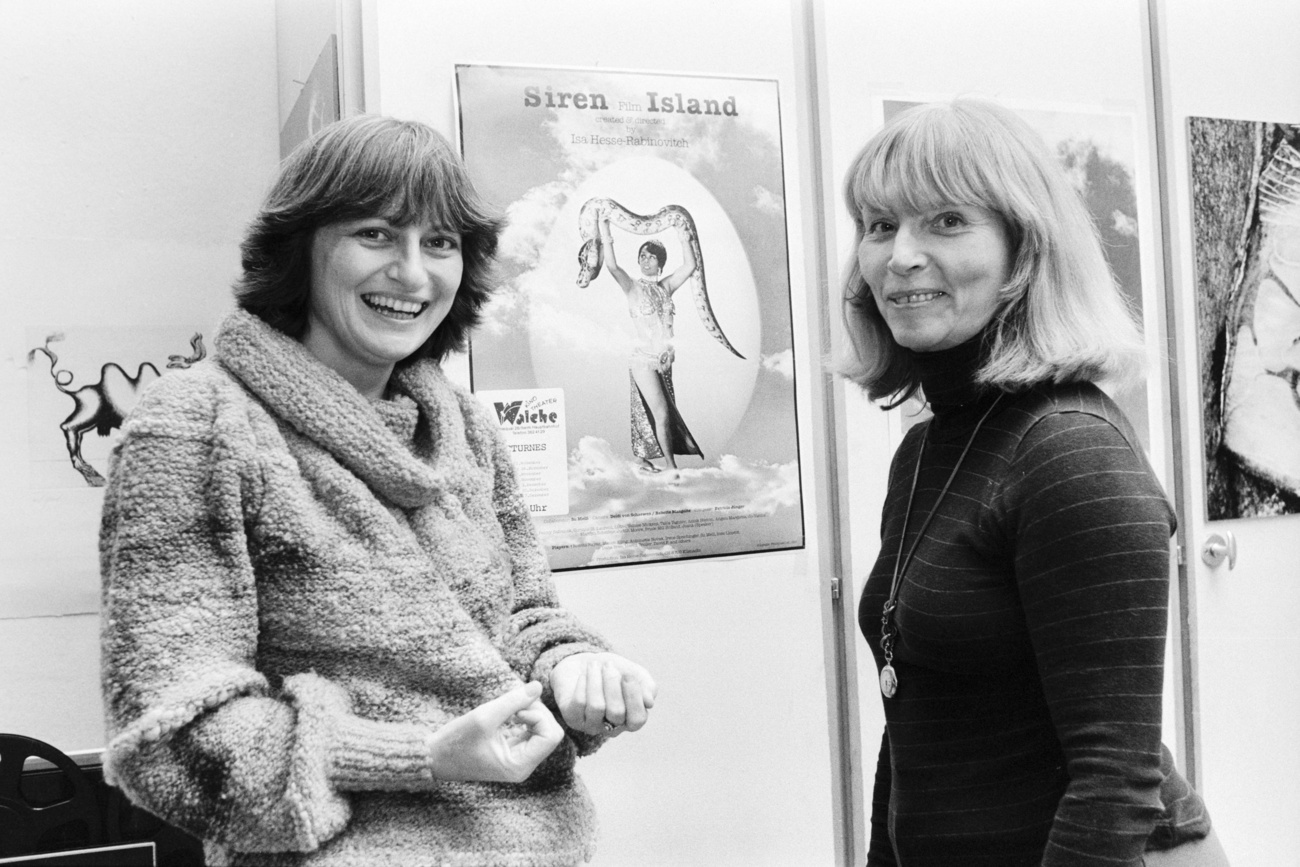 Isa Hesse-Rabinovitch (on the right) with singer and composer Veronique Mueller, who wrote a song for the film ‘Siren Island’, whose poster hangs on the wall; January 1982.