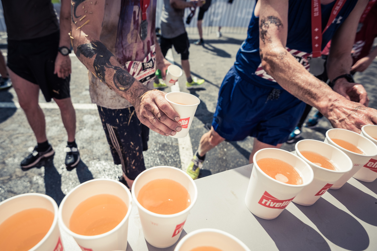 Rivella cups on a table at a sporting event