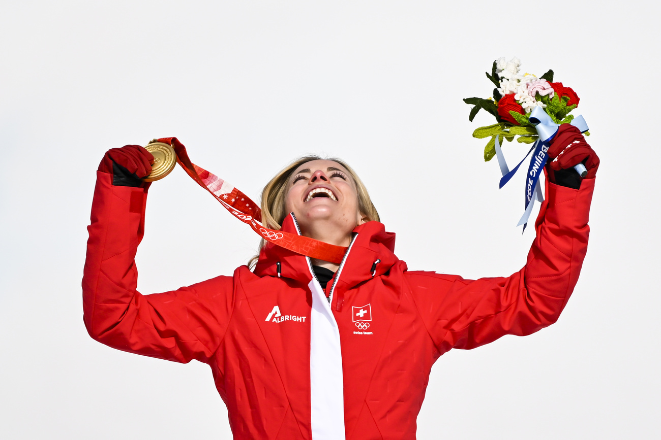 Lara Gut-Behrami celebrates after winning the gold medal in the women's Super-G at the Beijing 2022 Winter Olympics.