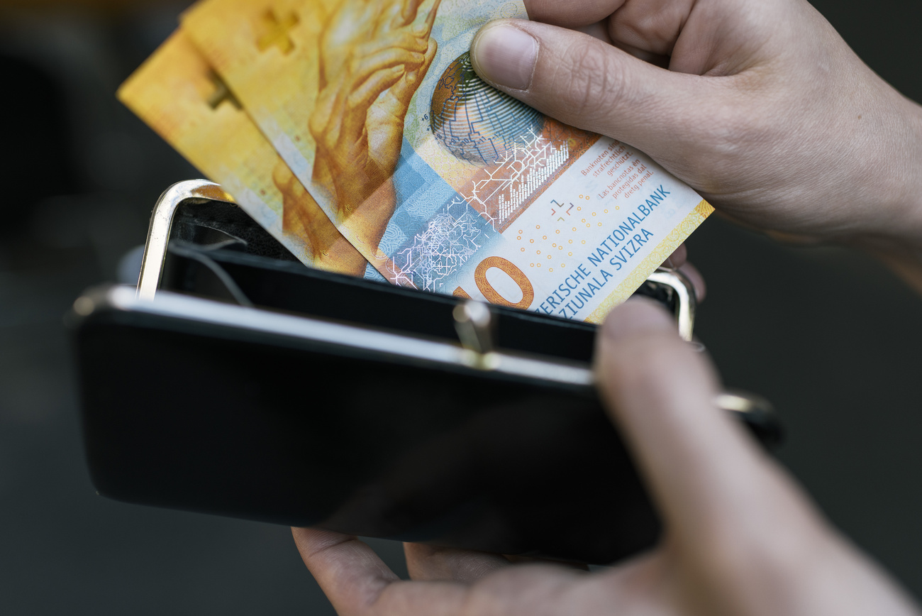Swiss francs in purse