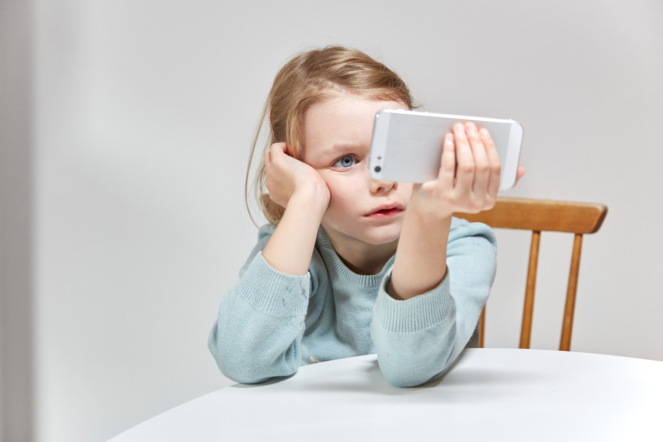 Kid on phone