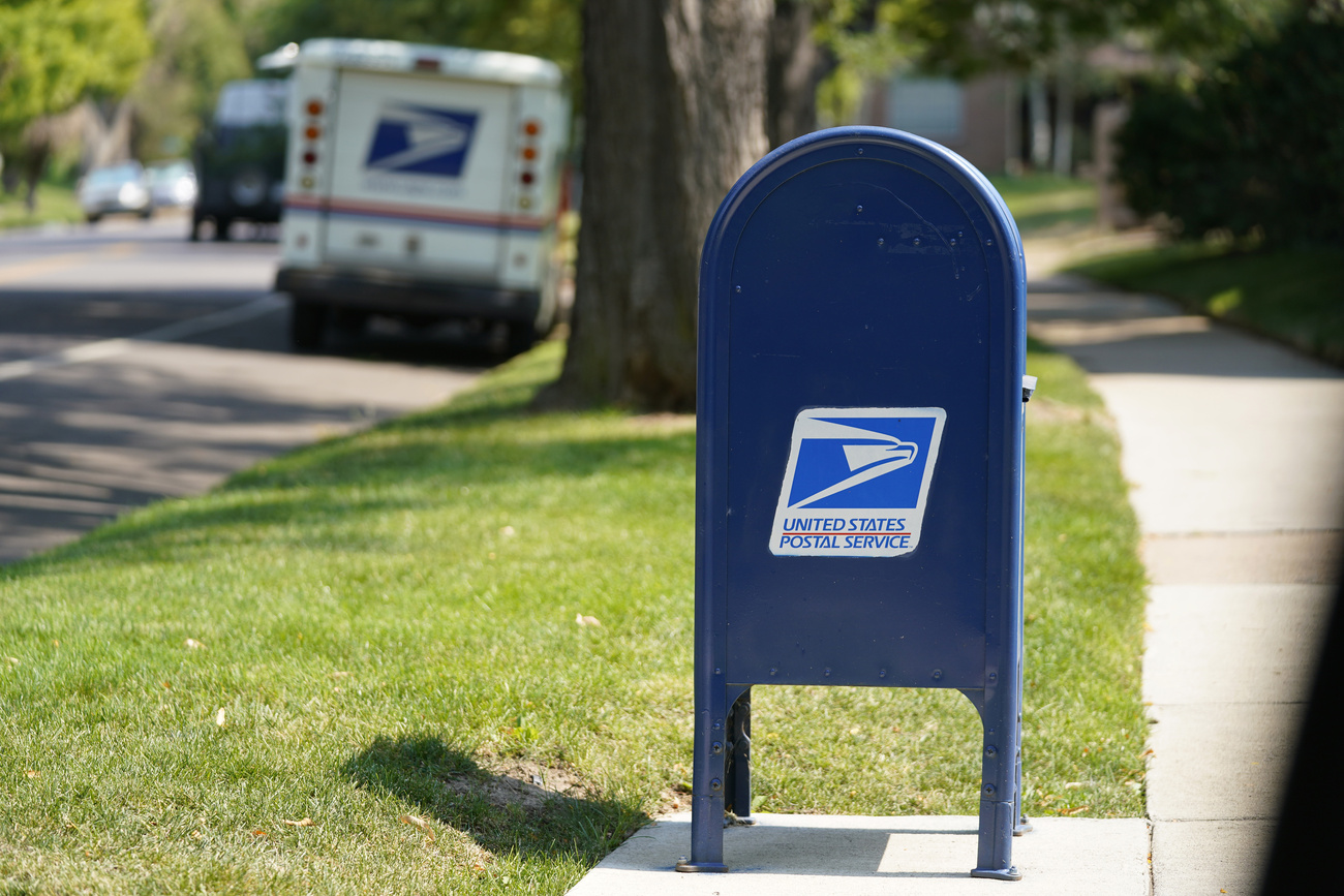 A United States Postal Service mailbox in Denver.