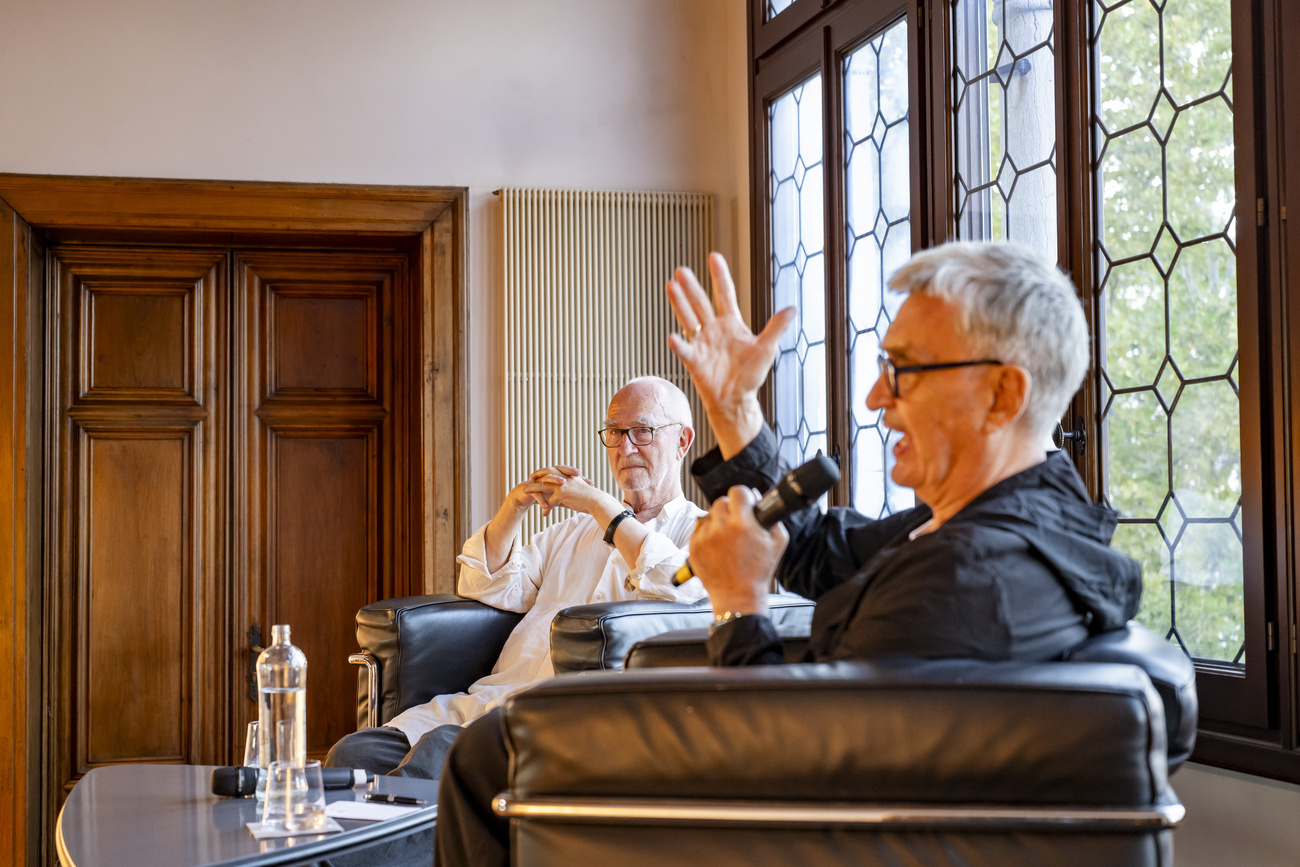 Peter Zumthor, left, and film director Wim Wenders, right, in a public talk at the Palazzo Trevisan, Venice, during the latest Venice Film Festival.