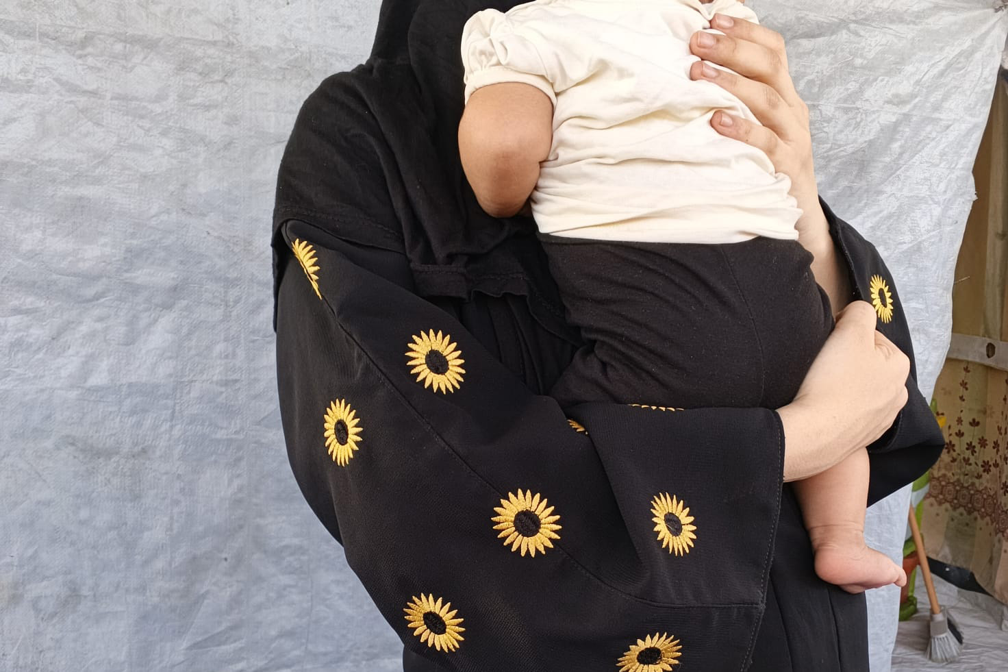 Woman in Gaza with baby.
