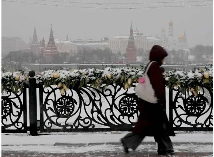 город