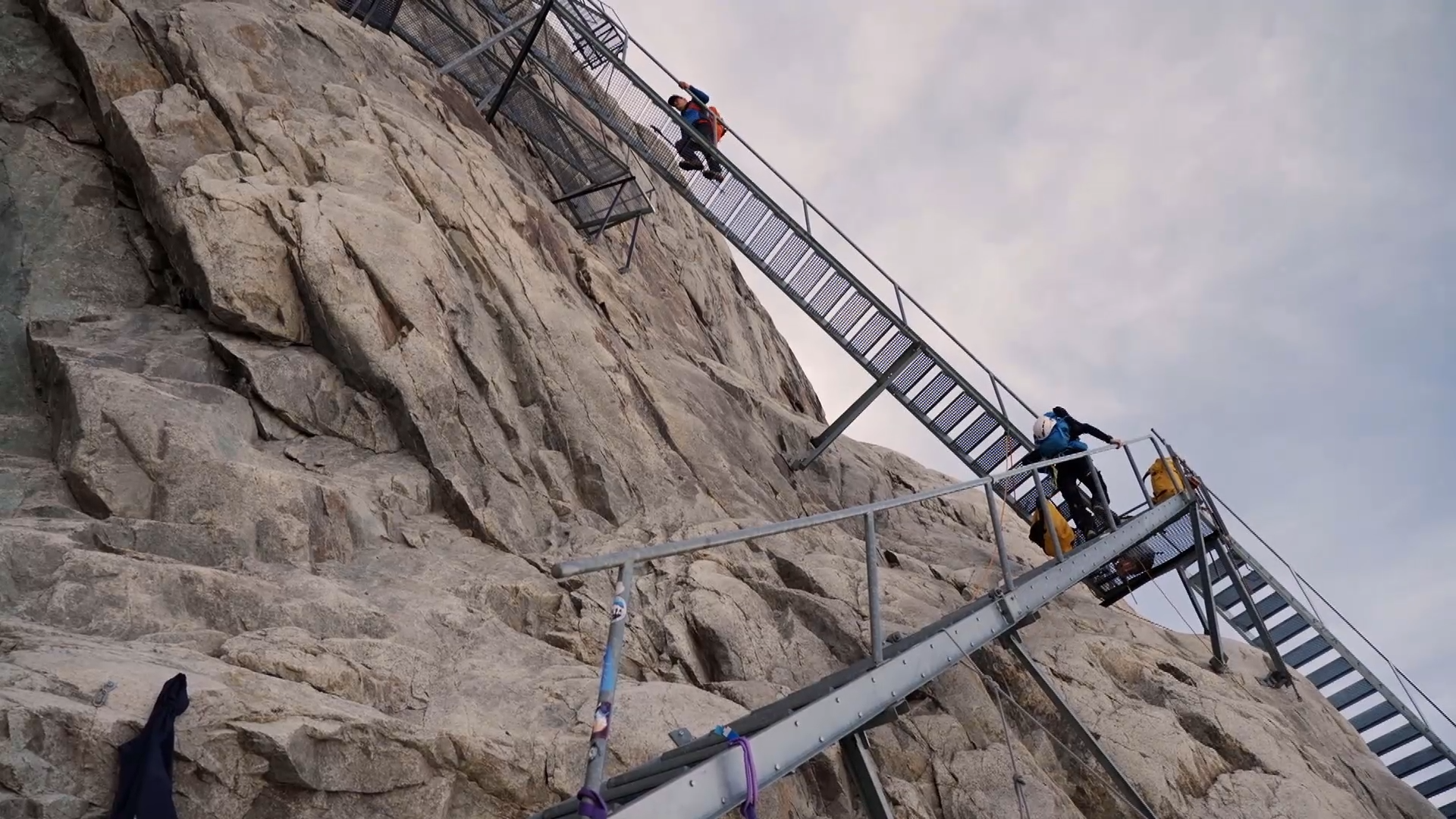 Visitors climb the hundreds of steps from the Aletsch Glacier to the Konkordia mountain hut.