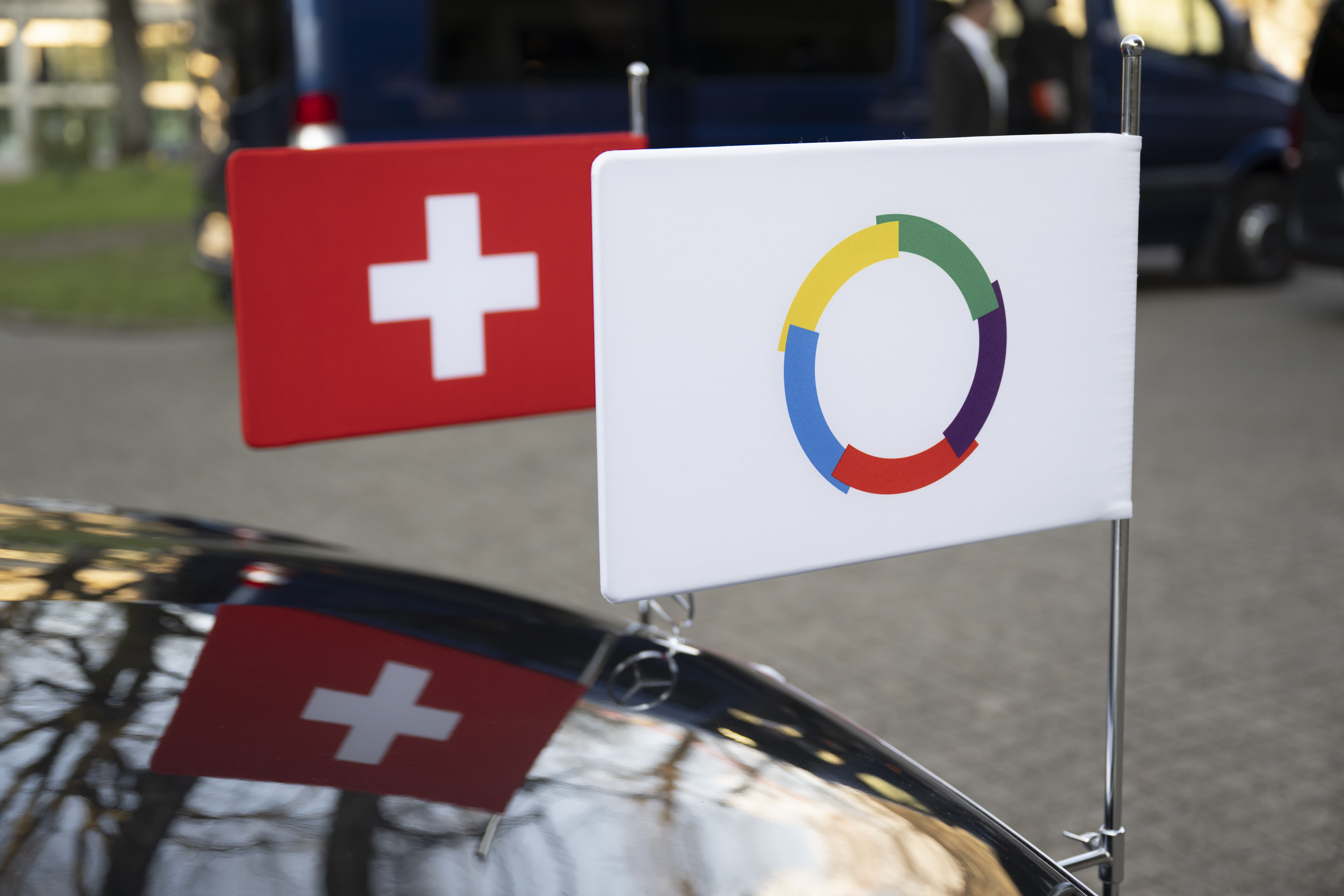 Swiss flag and flag of the Organisation internationale de la francophonie