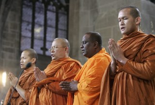 Buddhist monks praying in the cathedral