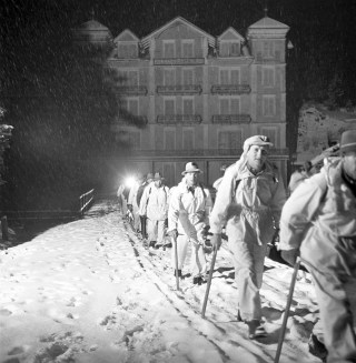 rescue team in dark and snow