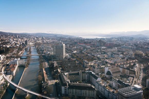 View of the city of Zurich with Lake Zurich in the background.