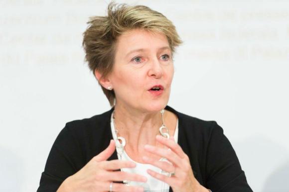Simonetta Sommaruga, gesticulates with her hands as she speaks to the media