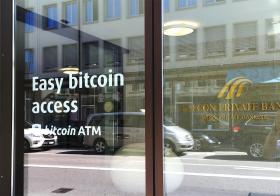 The front window of Falcon bank advertising Easy Bitcoin Access ATM
