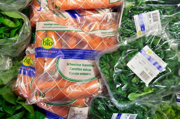 Fresh vegetables, pre-packaged carrots and salad from M-Bio on display on January 20, 2005 at Migros Limmatplatz in Zurich