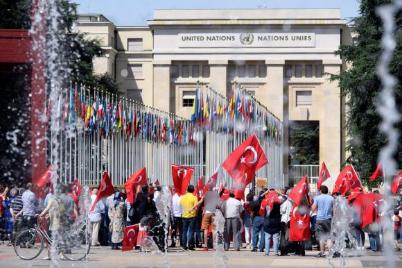 Supporters of the Turkish president rally in front of the United Nations at Geneva