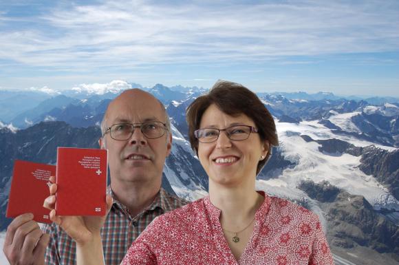 David and Domenika holding passports
