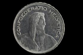 A Swiss coin, worth five Swiss francs, pictured on June 12,2012