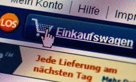 A cursor hovers over a symbol of a shopping cart on an online shopping website