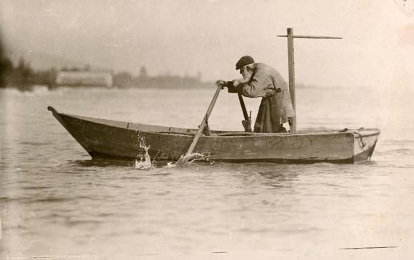 man in boat on a lake