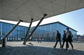 Students walk on the campus of the ETH Zurich