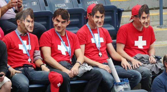 Fans of Roger Federer with Federer masks