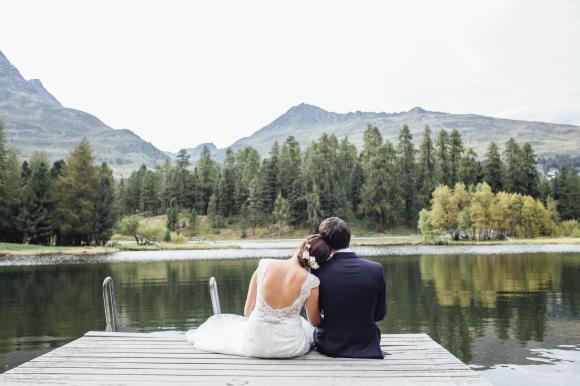 A wedding couple by the lake