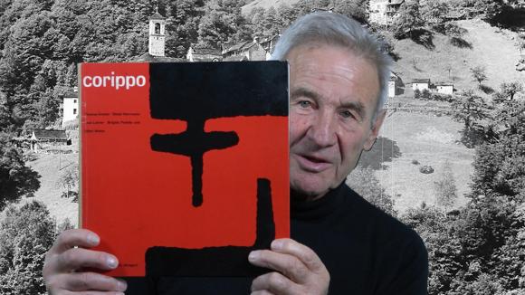 Thomas Amsel holds up book on Corippo