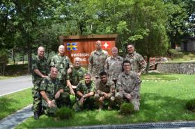 The five Swedish (left) and five Swiss soldiers who make up the neutral force at the DMZ