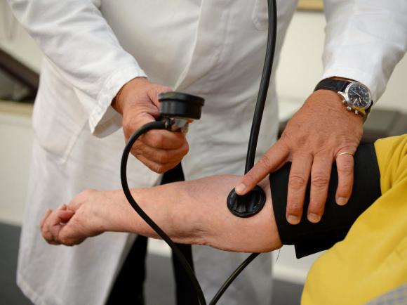 doctor treating patient