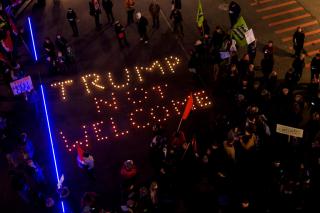 Protesters gather in Lausanne during the Trump not welcome in Switzerland!