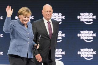 Angela Merkel, Chancellor of Germany together with German Klaus Schwab.