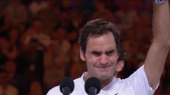 Federer accepts cup - tears up