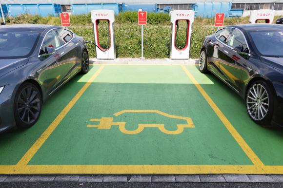 An electic car pictogram on a parking space at a supercharger station in Dietlikon, Switzerland