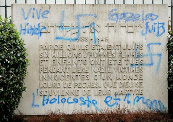 Anti-semitic graffiti on a Jewish memorial stone