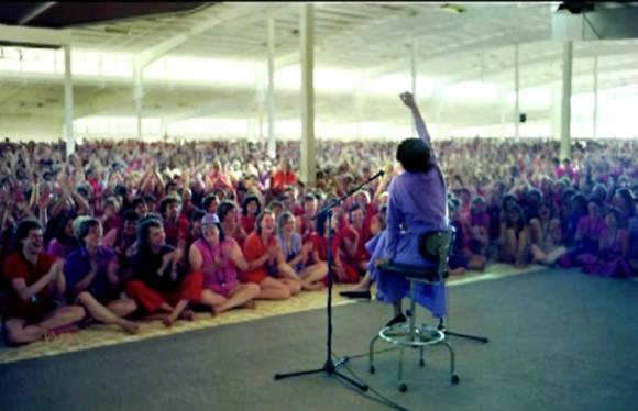Sheela addresing the rajneeshpuram commune