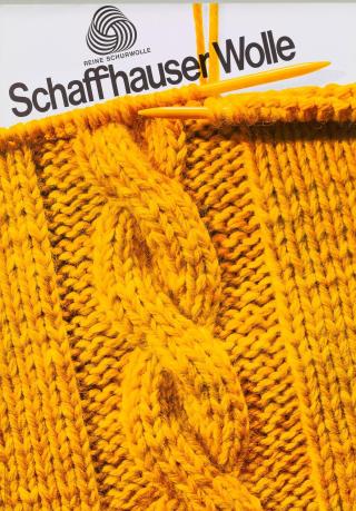 a poster depicting a cut of yellow, knitted wool with knitiing needles.