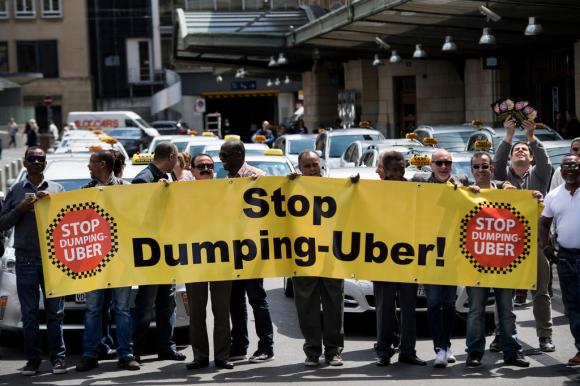 Disgruntled taxi drivers protest against Uber in Lausanne in May 2016