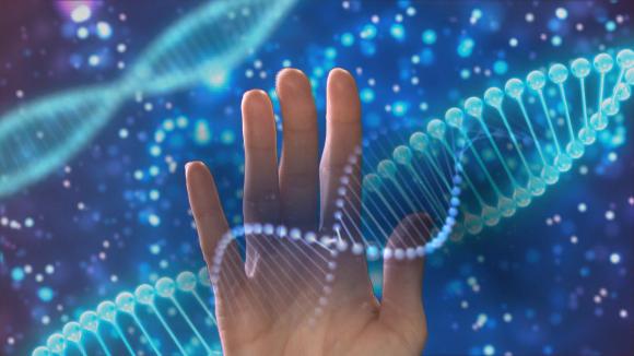 una mano con dei filamenti di DNA