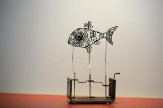 wire fish with turning handle
