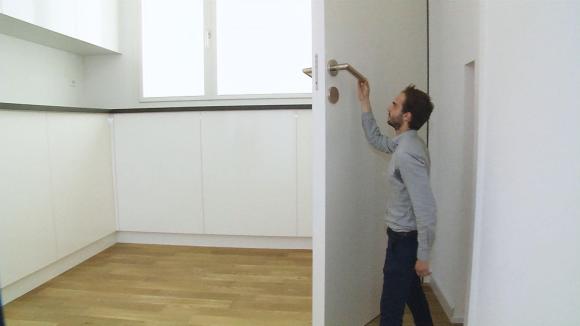 man enters giant room so looks small