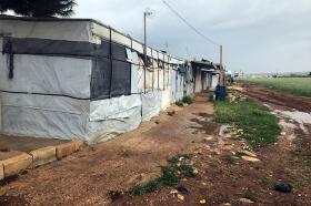 A row of tents inhabited by Syrian refugees living in Lebanon s Bekaa Valley.