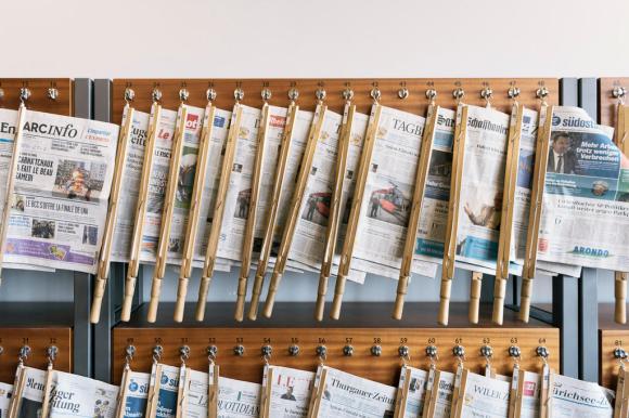 Newspapers on a rack