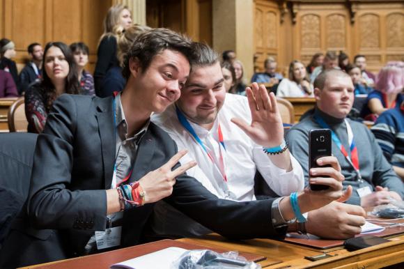 young people sitting in parliament