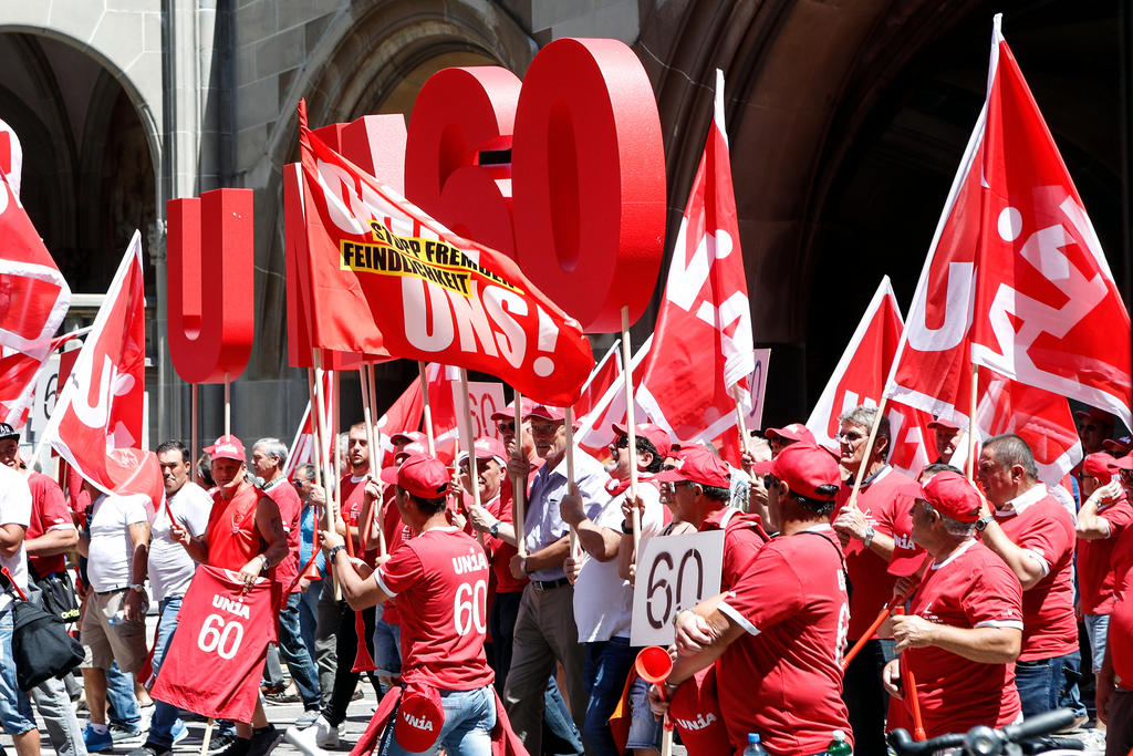 Over 18,000 construction workers demonstrate in Zurich SWI swissinfo.ch