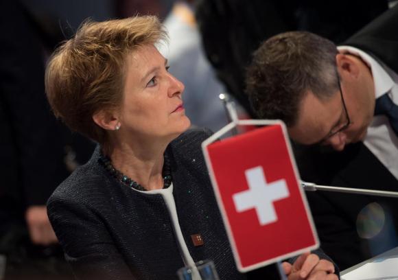 Justice Minister Sommaruga and a little Swiss flag